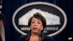 FILE - Attorney General Loretta Lynch speaks at a news conference, Sept. 22, 2016, at the Justice Department in Washington. The Justice Department is moving forward with its plans to collect data on how often law enforcement officers use force.