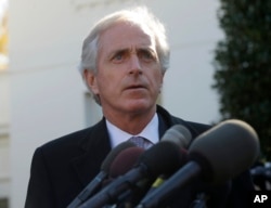 FILE - Sen. Bob Corker speaks to members of the media.