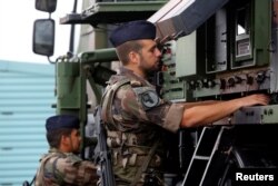 French soldiers take part in the joint NATO exercise 'Aurora 17' at Save airfield in Goteborg, Sweden, Sept. 13, 2017.