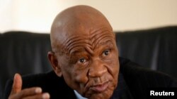 FILE PHOTO: Lesotho's Prime Minister Thomas Thabane gestures as he speaks during an interview with Reuters at State House in Maseru, Lesotho, February 27, 2015. REUTERS/Siphiwe Sibeko/File Photo