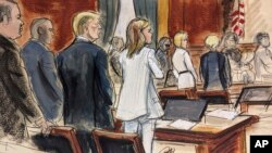 In this courtroom sketch, prospective jurors file into the courtroom as Donald Trump, third left, stands surrounded by his defense team. E. Jean Carroll, background second from right, stands with her attorney Roberta Kaplan, Tuesday, Jan. 16, 2024, in New York. 
