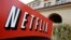 FILE - A sign points to Netfilx headquarters in Los Gatos, Calif. Netflix.