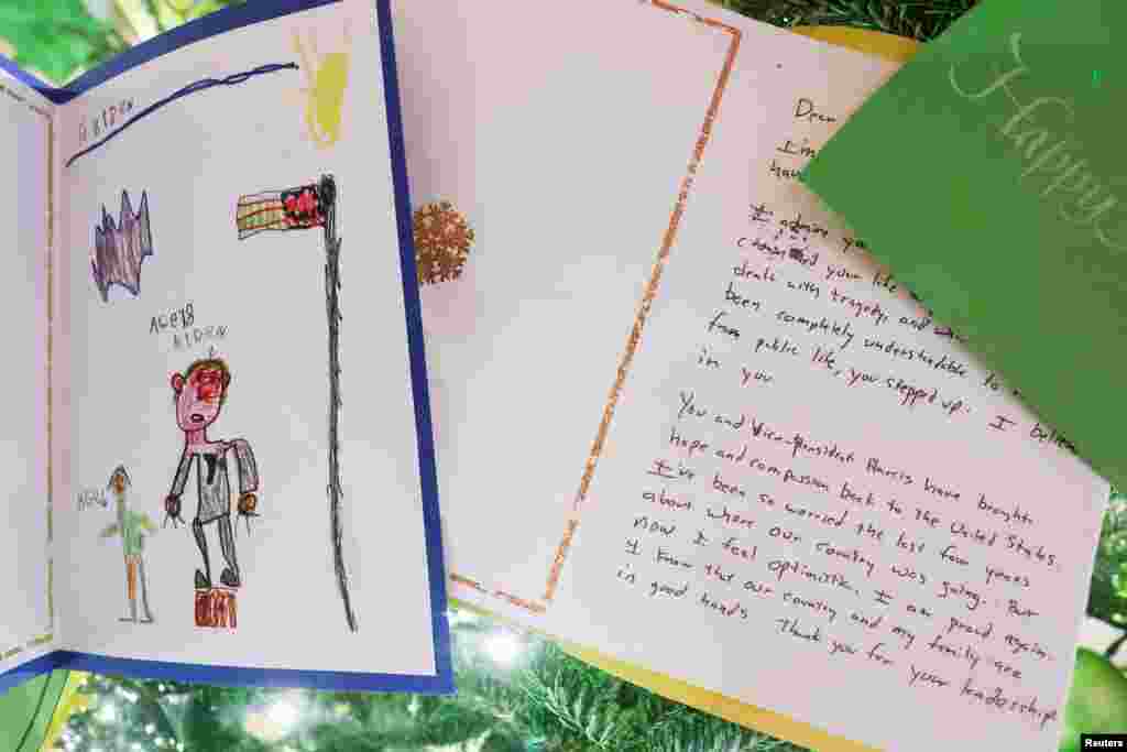 A Christmas tree in the East Room is decorated with thank-you notes, during a press tour of White House Christmas decorations ahead of holiday receptions by U.S. President Joe Biden and first lady Jill Biden in Washingto