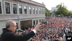 Turkey's President Recep Tayyip Erdogan addresses his supporters in Black Sea city of Trabzon, Turkey, Sunday, Aug. 12, 2018.