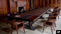 FILE - Image of a boardroom of the former Beneficial bank building and the future home of Drexel University's Thomas R. Kline School of Law, in Philadelphia, Sept. 16, 2014. The Swiss government on Friday embraced non-binding quotas for women on company boards and top executive posts at major listed companies, joining a campaign in Europe to dilute the traditional male dominance of senior jobs.