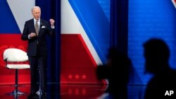 President Joe Biden talks during a televised town hall event at Pabst Theater, Feb. 16, 2021, in Milwaukee.