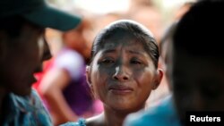 រូបឯកសារ៖ ស្រ្តីជាម្តាយកុមារីជនជាតិក្វាតេមាឡា ដែលបានស្លាប់។ 