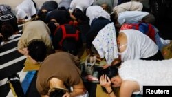 台北民众参与“万安”防空演习。（路透社2023年7月24日）