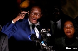 Zimbabwe's former Vice President Emmerson Mnangagwa, who is to be sworn in to replace Robert Mugabe as president, addresses supporters in Harare, Zimbabwe, Nov. 22, 2017.