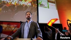 FILE - Spain's far-right VOX party leader Santiago Abascal delivers a speech as he celebrates the results of Andalusian regional elections in Seville, Spain, Dec. 2, 2018.
