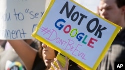 Workers protest against Google's handling of sexual misconduct allegations at the company's Mountain View, Calif., headquarters on Thursday, Nov. 1, 2018. (AP Photo/Noah Berger)