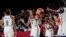 United States's Brittney Griner (15), center, and teammates celebrate after their win in the women's basketball gold medal game against Japan at the 2020 Summer Olympics, Sunday, Aug. 8, 2021, in Saitama, Japan. (AP Photo/Eric Gay)