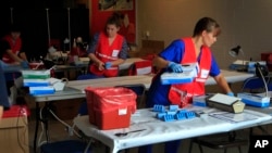 The artistic concept compares Earth (left) to the new planet, called Kepler-452b, which is about 60 percent larger. The illustration represents one possible appearance for Kepler-452b -- scientists do not know whether the planet has oceans and continents like Earth. (Image credit: NASA/Ames/JPL-Caltech/T. Pyle)