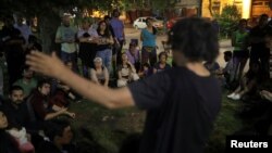 Neighbors gather while taking part in a neighborhood town hall meeting in Santiago, Chile November 2, 2019. Picture taken November 2, 2019. REUTERS/Pablo Sanhueza