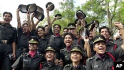 Women's rights activists and opposition party leaders on Monday, June 19, 2006 demanded a top army general be fired for his reported remarks that female officers have no place in India's army. (AP Photo/M. Lakshman, File)