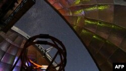 This NASA photo released on March 11, 2021 shows the view from inside the dome of NASA’s Infrared Telescope Facility as the 3.2-meter telescope atop Hawaii’s Mauna Kea will be used to measure the infrared spectrum of asteroid 2001 FO32. 