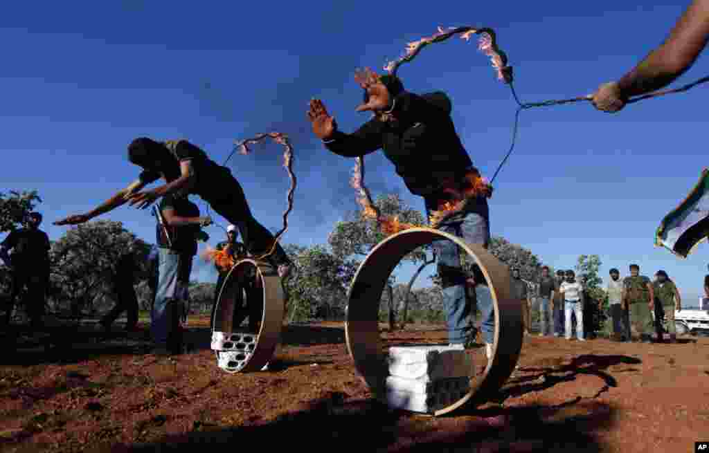 Free Syrian Army members train on the outskirts of Idlib, Syria, June 7, 2012.