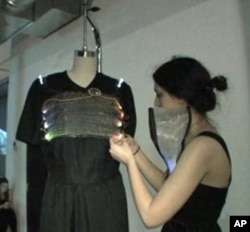 Tabor Barranti uses a microprocessor to to help her garment change colors.