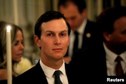 White House senior adviser Jared Kushner listens as U.S. President Donald Trump speaks at a dinner to honor evangelical leadership in the State Dining Room at the White House in Washington, Aug. 27, 2018.