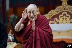 Tibetan spiritual leader the Dalai Lama greets devotees at the Buddha Park in Bomdila, Arunachal Pradesh, India, Wednesday, April 5, 2017.