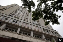 An abandoned building stands in the middle-class Flamengo neighborhood of Rio de Janeiro, April 7, 2015.