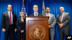 Benjamin Glassman, United States Attorney of the Southern District of Ohio, speaks during a news conference, July 18, 2019, in Cincinnati.