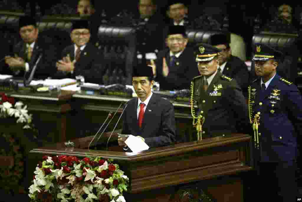 Indonesian President Joko Widodo delivers his inaugural speech as the country's seventh president at the parliament building in Jakarta, Indonesia, Oct. 20, 2014.