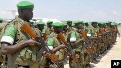 Part of the 3 battalion of the Uganda People's Defence Force prepare to leave for African Union peace keeping in Magadishu, Somalia, Friday Sept. 4. 2009, in Entebbe, Uganda. Uganda has sent another group of soldiers to Somalia for a peace keeping mission