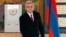 Armenian President Serge Sarkisian casts his ballot during presidential election in Yerevan, Armenia, Feb. 18, 2013.