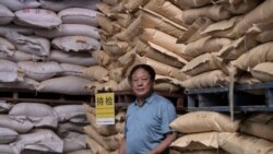 资料照：中国河北养猪农民孙大午在饲料仓库里 （2019年9月24日）