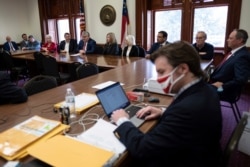 An alternate slate of electors nominated by the Republican Party of Georgia cast their own electoral votes for President Donald Trump Vice President Mike Pence at the Georgia State Capitol, Dec. 14, 2020.