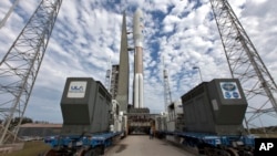 In this undated photo provided by NASA, a United Launch Alliance Atlas V rocket carrying the GOES-S satellite waits for liftoff March 1, 2018, at Cape Canaveral Air Force Station in Florida. 