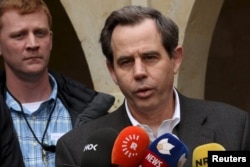 On Feb. 24, 2016, then-U.S. Ambassador to Iraq Stuart Jones speaks to the media in Shikhan, Iraq.