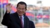Cambodia's Prime Minister Hun Sen greets his government officials as he arrives to watch the boat races at the Royal Palace during the annual water festival in Phnom Penh, Cambodia, Thursday, Nov. 2, 2017. The 3-day traditional water festival is dedicated