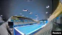 FILE - A general view of the Aquatics Centre at the Olympic Park in Stratford, the location of the London 2012 Olympic Games, in east London, July 19, 2012. The center was designed by renowned Iraqi-British architect Zaha Hadid.