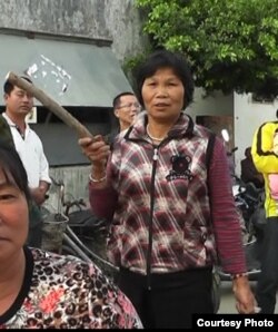 杨锦贞因“擅自举行集会”被判处六年徒刑。