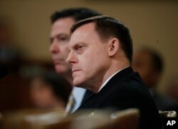 National Security Agency Director Michael Rogers, front, and FBI Director James Comey, testify on Capitol Hill, March 20, 2017, before the House Intelligence Committee hearing on allegations of Russian interference in the 2016 U.S. presidential election.