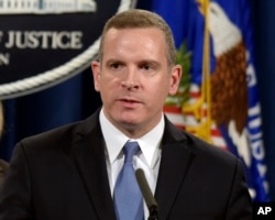 FILE - Paul Abbate, an assistant FBI director, speaks during a news conference at the Justice Department in Washington, March 15, 2017.