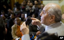 Presidential candidate Moussa Mustafa Moussa of the Ghad, or Tomorrow Party, talks during a press conference at his office in Cairo, Egypt, Jan. 29, 2018.