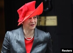 Britain's Prime Minister Theresa May leaves 10 Downing Street in London, March 12, 2018.