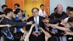 U.S. Special Envoy for Six-Party Talks Sydney Seiler, center, speaks to the media after his meeting with South Korean senior officials at the Foreign Ministry in Seoul, South Korea, July 27, 2015. 