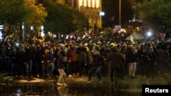 Demonstrators rally at a protest against the ruling elite they accused of steering Lebanon towards the current economic crisis, in Beirut, Lebanon, Jan. 19, 2020.
