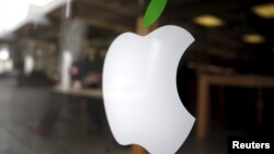 The Apple logo appears on an Apple store in Los Angeles, California, United States, April 22, 2016. Apple has refused to write software for its devices to allow the FBI to bypass encrypted passcodes.