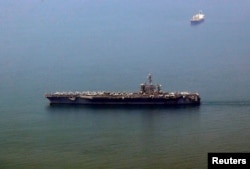 美国“卡尔•文森”号航母抵达越南中部港口城市岘港。（2018年3月5日）