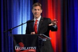 FILE - Sen. Ben Sasse, R-Neb., speaks during a legislative summit sponsored by the Omaha and Lincoln Chambers of Commerce, which was held at the Strategic Air Command &amp; Aerospace Museum in Ashland, Nebraska, Aug. 8, 2019.