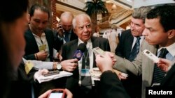 Egypt's then-Finance Minister Hazem el-Beblawi addressing media during meeting of Gulf and Arab Finance Ministers, Abu Dhabi, Sept. 7, 2011.
