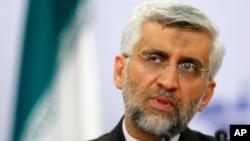 Chief Iranian nuclear negotiator Saeed Jalili speaks during a news conference after discussions on the controversial Iranian nuclear program in Moscow, June 19, 2012.