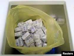 Boxes of anti-dengue vaccine Dengvaxia are placed inside a freezer for storage at the Manila Health Department in Sta Cruz, metro Manila, Philippines, Dec. 5, 2017.