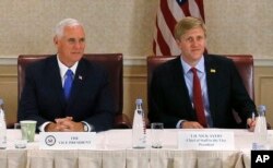 FILE - Vice President Mike Pence, left, attends a meeting with Georgia opposition leaders in Tbilisi, Georgia. Chief of Staff to the Vice President, Nick Ayers, is right.