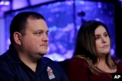 Bill and Theresa Striffler talk to a reporter at their home in Brick, N.J., Jan. 9, 2019. Bill Striffler, an air traffic controller and the president of the Newark Airport National Air Traffic Controllers Association, is facing his first pay day without a pay check.